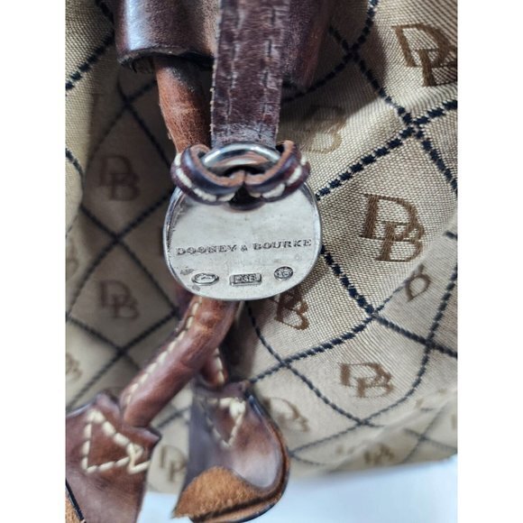 B2501G_CNBLPATN.jpg?crop=  Vintage Dooney And Bourke Canvas Drawstring‎ Shoulder Bag Purse J1393495 A-2 main image 1